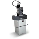 Sample Grinding Machine: A machine manufactured by us that is used to grind cast iron samples for analysis in a spectrometer.
