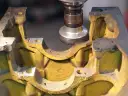 Cylinder Boring and Surface Milling Machine BVC-1600X — Cast iron engine block being milled on BVC-1600X boring machine with clamping system